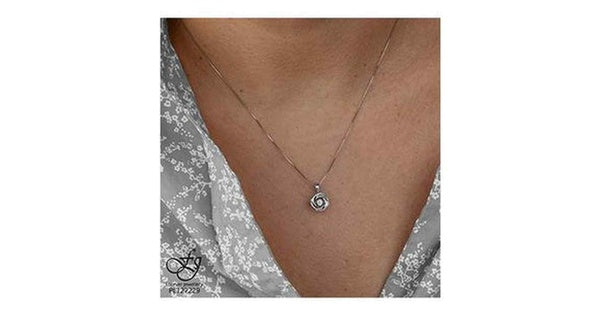 10K White Gold Pulse Diamond (0.02 ct. T.W.) Swirling Flower Necklace
