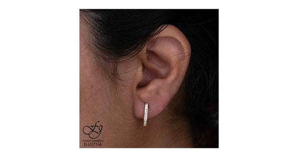 10K Yellow Gold Diamond (0.10 ct. T.W.) Channel Set Huggies