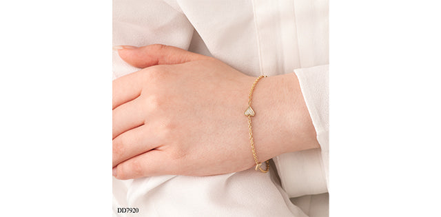 0.05 ct T.W. Heart Diamond Station Gold Bracelet