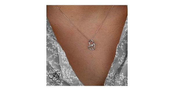 10K White Gold Pulse-Dancing Diamond (0.02 ct. T.W.) Double Heart Necklace
