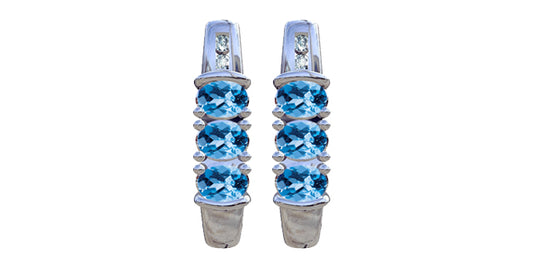Blue Topaz & Diamond Stud Earrings in  White Gold